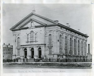 Immaculate Conception Church exterior with fence