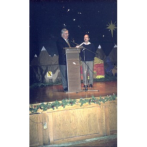 David Cortiella and Mayor Thomas Menino on stage during celebration of Three Kings Day.