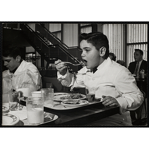 A member of the Tom Pappas Chefs' Club enjoys a meal in a Brandeis University dining hall