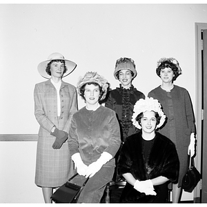 Five Faculty Wives Club members pose together