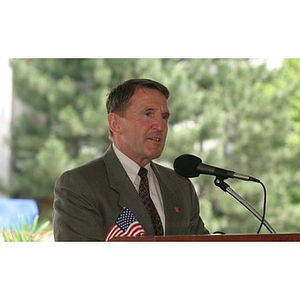 Retired General Richard Neal speaks from the podium at the Veterans Memorial groundbreaking ceremony