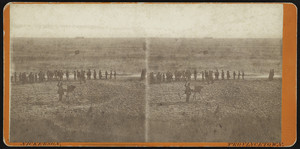 Stereograph of a man photographing a group of people on a beach, Provincetown, Massachusetts, undated