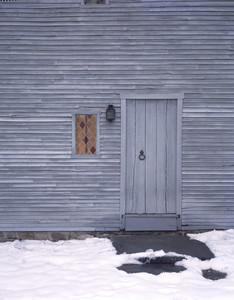 Exterior view of the front door, closed, winter, Arnold House, Lincoln, R.I.