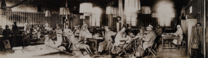 Panoramic view of soldiers and one Red Cross worker inside a canteen