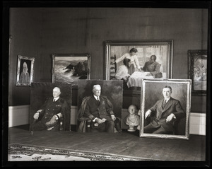 Caleb Arnold Slade portraits laid out in his studio