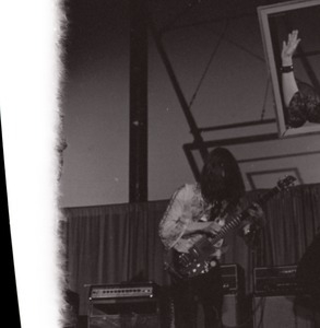 Unidentified band in performance in what appears to be a high school gymnasium