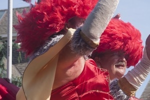 Float with The Hat Sisters, Tim O'Connor waving to the crowd and John Michael Gray (right) : Provincetown Carnival parade