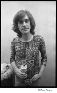 Ray Davies (The Kinks): half-length portrait drinking a beer backstage at the Boston Tea Party