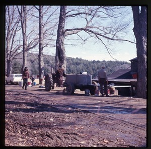 Tractor and farmers along the road while sugaring, Montague Farm Commune