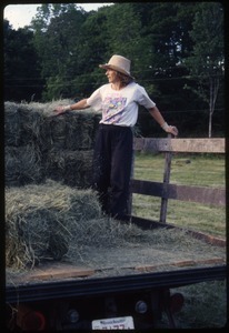 Nina Keller on hay truck, Wendell Farm