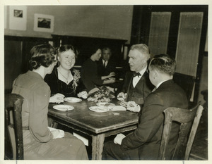 Hugh P. Baker dining with his wife and another couple