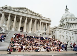 Congressman John W. Olver with large group of visitors, posed on the steps of the United States Capitol building