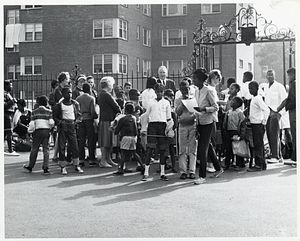 Mayor John F. Collins with large group of children outdoors