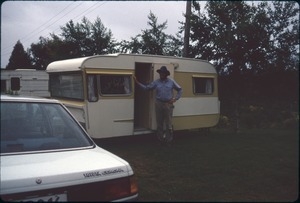 Man standing outside trailer