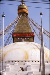 Boudhanath Stupa, woman sweeping steps