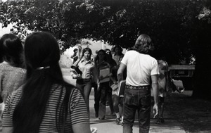 UMass Amherst students walking near the library