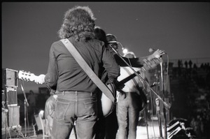 Hollywood Speedway Rock Festival: unidentified band in concert: view of guitarists from behind