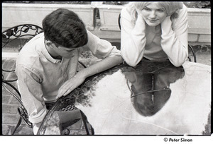 Peter Simon and Karen Helberg, playing with water on a table top