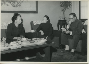 Shirley Graham Du Bois sitting with two unidentified Chinese officials
