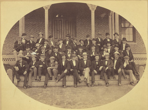 Class of 1871 members gather on the steps of North College