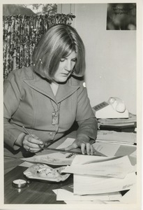 Rae Unzicker working at table