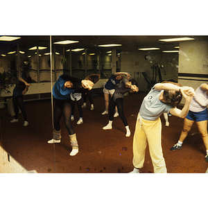 Women stretching in a gym