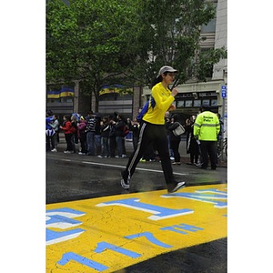 Runners crossing finish line at "One Run" event in Boston (May 2013)
