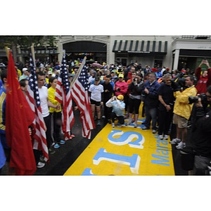 Flags at Boston Marathon finish line before "One Run" event in Boston (May 2013)
