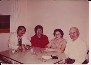Beatriz Correa Caselle with family at table
