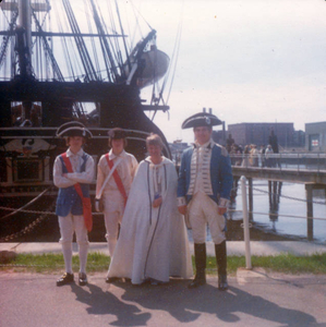 Our family touring in fron of Old Ironsides in colonial dress