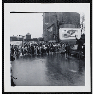 Boys wait to for a man to fire a start gun at the beginning of the Roxbury Road Race