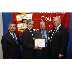 Joseph Golemme poses with his certificate and three others at the National Council Dinner