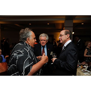 Robert Matz conversing with President Aoun and Dennis Picard