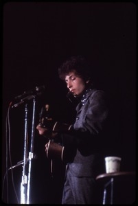 Bob Dylan performing on stage