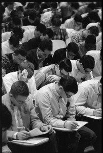 Students taking the Selective Service College Qualification examination to determine eligibility for an educational deferment from service in the Vietnam War