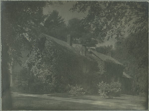 Unidentified ivy-covered house