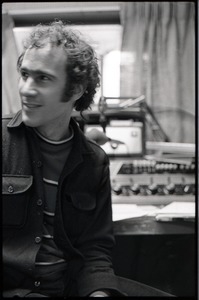 Informal portrait of Richard Safft in radio broadcast studio