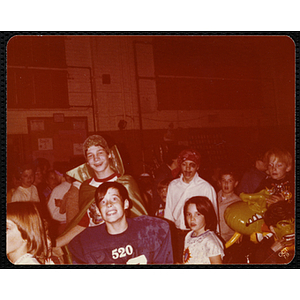 Children in Halloween costumes attend a party