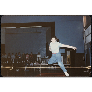 A girl jumps over a rope at the Charlestown gymnasium