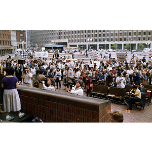 Crowd of protesters as they listen to the speaker at a rally for Long Guang Huang in City Hall Plaza in Boston