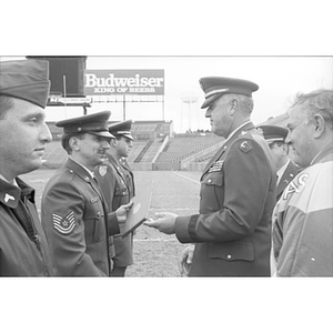 ROTC cadets and officers at a veterans ceremony at Foxboro Stadium