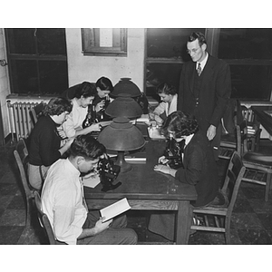 Students sit at a table in a physiology laboratory