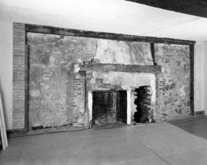 Interior view of north wall fireplace with surround removed, Spencer-Peirce-Little House, Newbury, Mass.