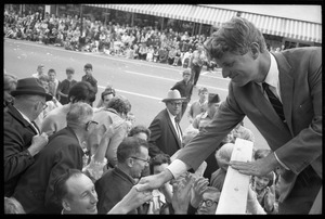 Robert F. Kennedy greeting the crowd across the street from the Woolworth store in Worthington during the Turkey Day festivities