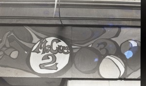 Front entrance to McCue 2 pool hall: close-up of sign