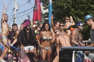 Parade marchers in skimpy outfits : Provincetown Carnival parade