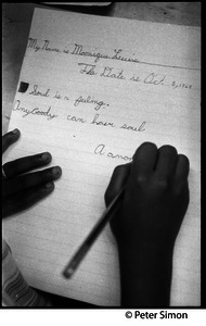 Close-up of child writing: 'My name is Monique Leucie... Soul is a feeling. Anyboody can have soul': Liberation School, Boston, Mass.