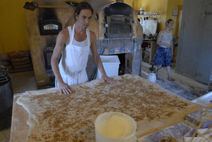 Hungry Ghost Bread: owner and baker Jonathan C. Stevens working on cinnamon rolls