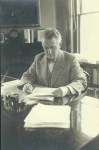 Hugh P. Baker at his office desk