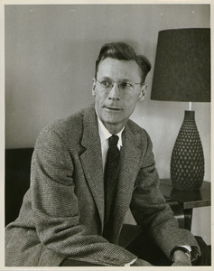 Edward A. Buck sitting indoors